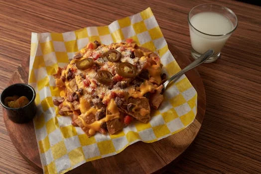 loaded nachos cheese jalapenos guacamole